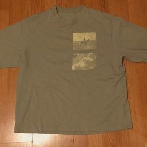 Designer T-shirt with horse logo on it.